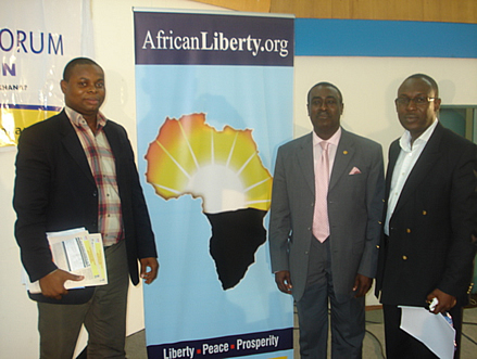 Captain Budu Koomson in the middle with IMANI-AfricanLiberty's Franklin Cudjoe and Kofi Bentil